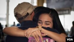 Father and daughter embrace at a Washington, D.C., airport in June 2017 after almost 20 separated. The last time Rosemary Silva Pimentel saw her dad she was six-years-old. (Photo courtesy Rosemary Silva Pimentel)