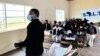 Women from Chimanimani discuss lessons provided by the international charity Voluntary Service Overseas about their legal rights under Zimbabwe's constitution, on March 18, 2022. (Columbus Mavhunga/VOA)