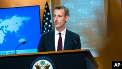 FILE - State Department spokesman Ned Price speaks during a news conference at the State Department, March 10, 2022.