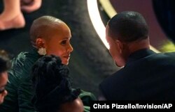 Jada Pinkett Smith, left, and Will Smith at the Oscars at the Dolby Theater on Sunday, March 27, 2022. (AP Photo/Chris Pizzello)