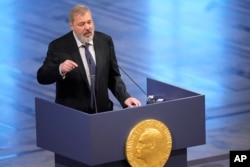 FILE - Nobel Peace Prize winner Dmitry Muratov from Russia speaks during the Nobel Peace Prize ceremony at Oslo City Hall, Norway, Dec. 10, 2021.