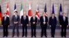 From left, Japan's PM Fumio Kishida, Canada's PM Justin Trudeau, U.S. President Joe Biden, Germany's Chancellor Olaf Scholz, British PM Boris Johnson, France's President Emmanuel Macron, Italy's PM Mario Draghi in a G7 leaders' group photo in Brussels, March 24, 2022.