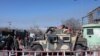 资料照片：塔利班武装人员在阿富汗首都喀布尔的大街上站岗。（2022年1月27日）