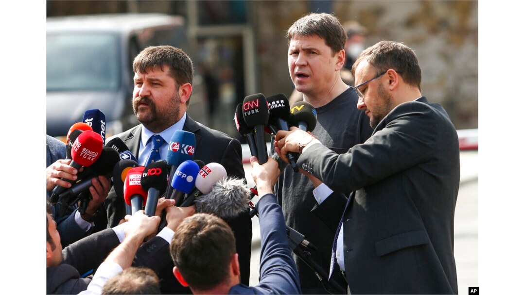Mykhailo Podolyak, a member of the Ukrainian delegation, center right, speaks to the media after talks between Russian and Ukrainian delegations, in Istanbul, March 29, 2022.
