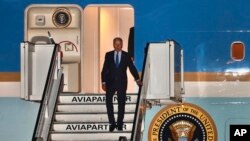 U.S. President Joe Biden steps off Air Force One as he arrives at Melsbroek military airport in Brussels, Belgium, March 23, 2022. 