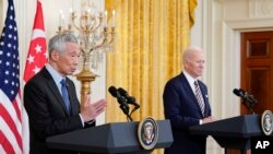 Singapore's Prime Minister Lee Hsien Loong speaks alongside President Joe Biden in the East Room of the White House, Tuesday, March 29, 2022, in Washington. (AP Photo/Patrick Semansky)