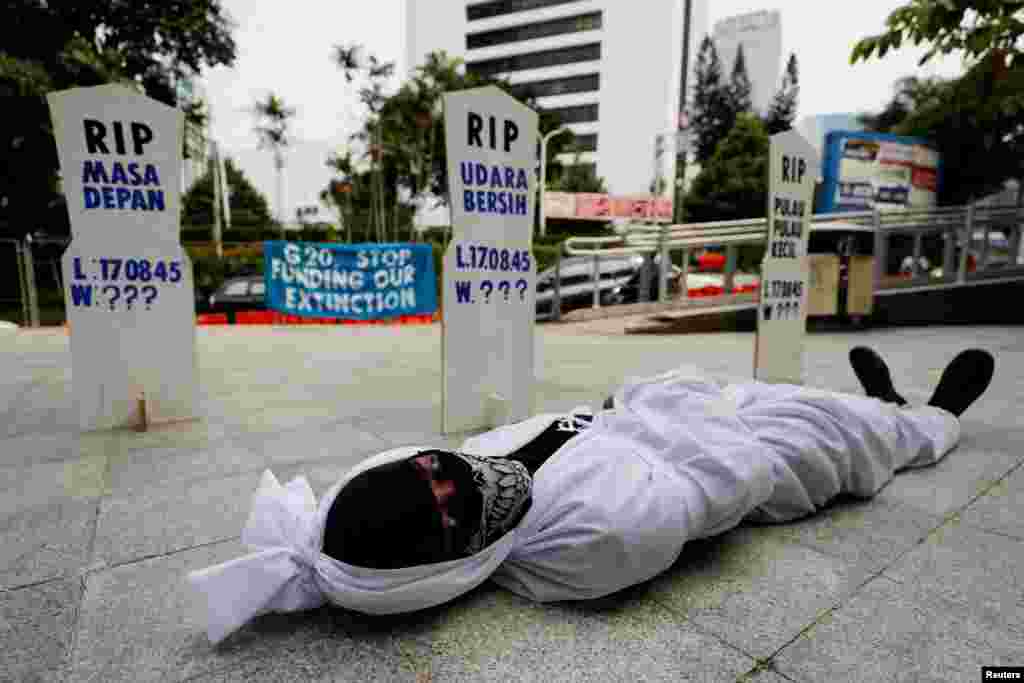 An activist takes part in a protest urging governments to act against climate change and social injustice in Jakarta, Indonesia. ( REUTERS/Willy Kurniawan )