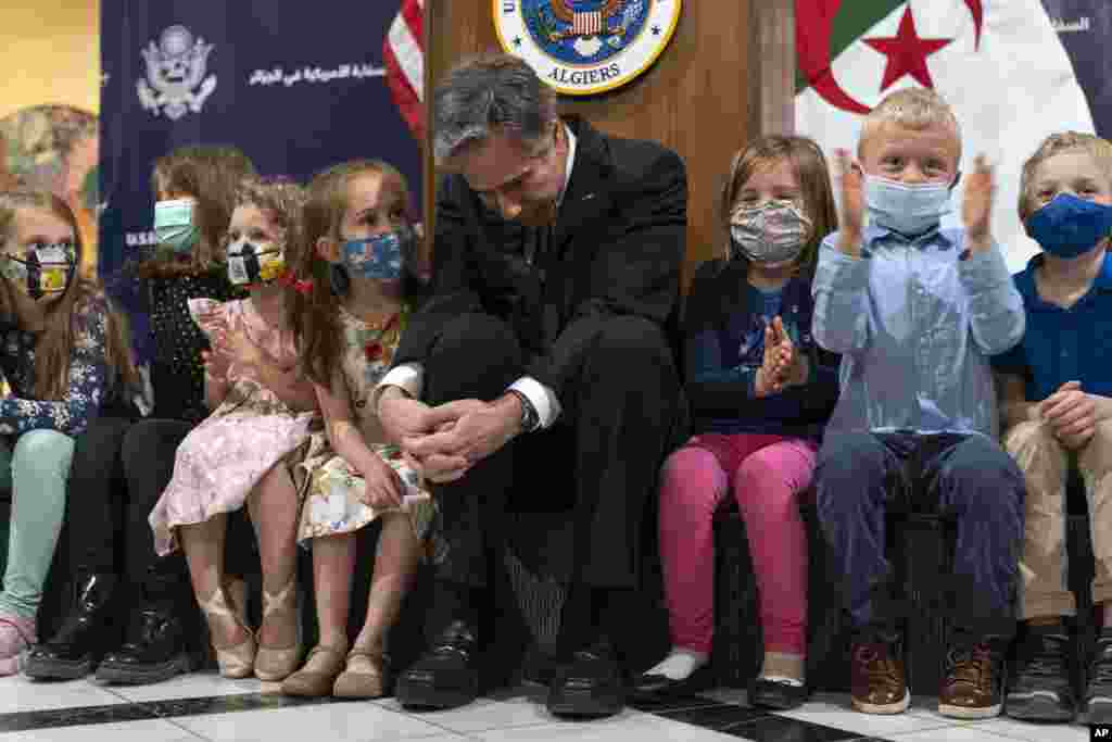 U.S. Secretary of State Antony Blinken listens to a question from the daughter of a staff member at the U.S. Embassy Algiers in Algiers, Algeria.