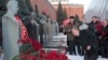 Communist party leader Gennady Zyuganov places flowers on Stalin's grave in Red Square, outside the Kremlin wall, Moscow, March 5, 2013.