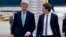U.S. Secretary of State John Kerry (L) walks to his car with Austria's Foreign Minister Sebastian Kurz as he arrives at Vienna International Airport, in Vienna, Austria, Oct. 15, 2014. 
