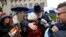 Rabbi Chuck Diamond, center, a former rabbi at the Tree of Life synagogue, hugs a woman after leading a Shabbat service outside Tree of Life, Nov. 3, 2018, in Pittsburgh. On Oct. 27, 11 people were killed and six wounded when a gunman attacked them in the synagogue. 