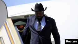 FILE - South Sudan President Salva Kiir exits his plane, Nov. 1, 2017.