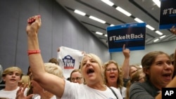Supporters at a Take It Back California event where former President Barack Obama campaigns in in support of California congressional candidates, Sept. 8, 2018, in Anaheim, Calif. 