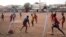 FILE - A neighborhood team plays soccer in the ACI 2000 neighborhood of Bamako, Mali, May 10, 2018. 