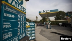 FILE - The prices at a Valero Energy Corp gas station are pictured in Pasadena, California, on Oct. 27, 2015. 