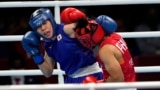 Philippines's Nesthy Petecio, right, exchanges punches with Japan's Sena Irie during their women's featherweight 60-kg final boxing match at the 2020 Summer Olympics, Tuesday, Aug. 3, 2021, in Tokyo, Japan. (AP Photo/Themba Hadebe)