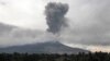 Mount Sinabung spews thick smoke in Karo, North Sumatra, Aug. 17, 2020. In addition to the volcano, two earthquakes struck off Indonesia's Sumatra island early Wednesday.