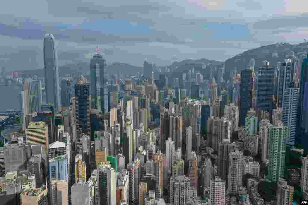 An image from above shows residential and commercial buildings in Hong Kong.