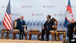 U.S. President Joe Biden, left, speaks during a meeting with Cambodian Prime Minister Hun Sen during the Association of Southeast Asian Nations (ASEAN) summit, in Phnom Penh, Cambodia, Nov. 12, 2022.