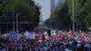 Citizen organizations march in support of Mexico's National Elections Institute as President Andrés Manuel López Obrador pushes to reform it, in Mexico City, Sunday, Nov. 13, 2022. 
