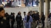 Police officers block the street after an explosion on busy pedestrian Istiklal street in Istanbul, Turkey, Nov. 13, 2022. 