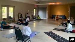 Participants in a six-week mindfulness course put on by East St. Tammany Habitat for Humanity and the Northshore Community Foundation gather in Slidell, Louisiana, Nov. 4, 2022.