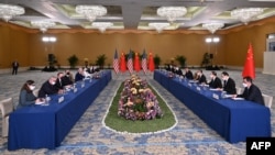 US President Joe Biden (L) and China's President Xi Jinping (R) meet on the sidelines of the G20 Summit in Nusa Dua on the Indonesian resort island of Bali, Nov. 14, 2022.