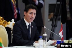 លោក Justin Trudeau នាយករដ្ឋមន្ត្រីកាណាដា ថ្លែងនៅក្នុងកិច្ចប្រជុំកំពូលរំឭកខួបនៃទំនាក់ទំនងអាស៊ាន កាណាដា នៅរាជធានីភ្នំពេញ ថ្ងៃទី ១២ ខែវិច្ឆិកា ឆ្នាំ ២០២២។