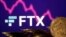 FILE: Representations of cryptocurrencies are seen in front of displayed FTX logo and decreasing stock graph in this illustration taken Nov.10, 2022