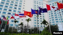 Flags of participating countries fly outside the venue as Cambodia hosts the Association of Southeast Asian Nations summit in Phnom Penh, Nov. 10, 2022.