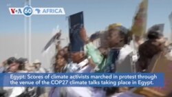 VOA60 Africa - Egypt: Scores of climate activists march through the venue of the COP27 climate talks