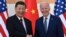 Presiden China Xi Jinping (kiri) dan Presiden AS Joe Biden berjabat tangan saat mereka bertemu di sela-sela KTT G-20 di Nusa Dua di Bali, hari Senin 14 November 2022.