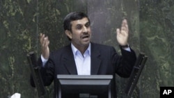 Iranian President Mahmoud Ahmadinejad answers questions in an open session in parliament in Tehran, Iran, Wednesday, March 14, 2012. 