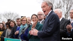 FILE - Sen. Ed Markey, D-Mass., and Rep. Alexandria Ocasio-Cortez, D-N.Y., hold a news conference for their proposed "Green New Deal" at the U.S. Capitol in Washington, Feb. 7, 2019. The Republican-led Senate rejected the plan March 26, 2019.