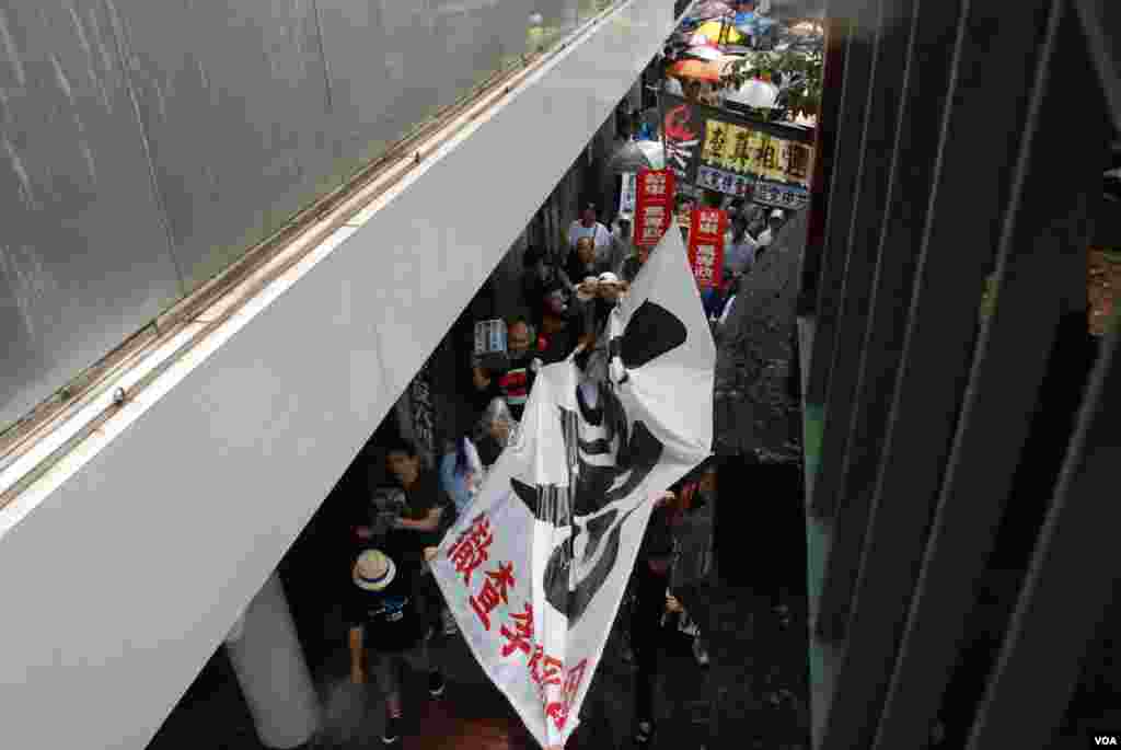 Parade pass through narrow streets.