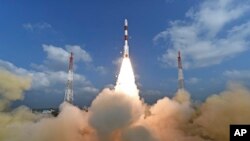 This photograph released by Indian Space Research Organization shows its satellite launch vehicle lifting off from a launch pad at the Satish Dhawan Space Centre in Sriharikota, India, Feb.15, 2017. (Indian Space Research Organization via AP)