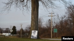 A photo of Doug Wiggington rests against a tree just feet from where he was shocked by a Taser on May 12, 2017, in Greenfield, Indiana, U.S., December 21, 2017. Picture taken December 21, 2017.