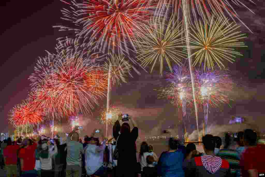 Fireworks illuminate the sky over UAE&#39;s capital city, Abu Dhabi, during celebrations ahead of the 46th Emirati National Day, celebrated on Dec. 2.