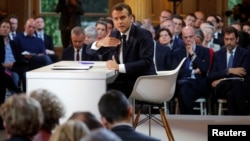 French President Emmanuel Macron speaks during a news conference to unveil his policy response to the yellow vests protest, at the Elysee Palace in Paris, France, April 25, 2019. 