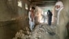 Suicide Bombers Kill Dozens at Shiite Mosque