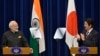 2016年11月11日，印度總理莫迪（左）和日本首相安倍晉三出席在日本東京安倍官邸舉行的聯合新聞發布會。