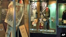 The exhibit at the Newseum features clothing worn by Elvis, which is on loan from Graceland.