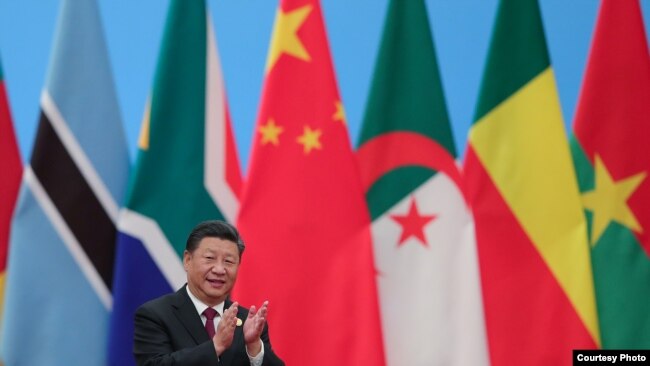 中国国家主席习近平2018年9月出席中非论坛(路透社转发媒体联合采访照片)
