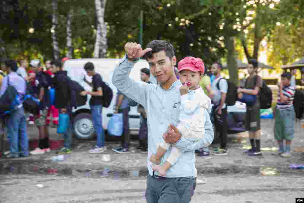 Relief, and a smile, in a small Serbian village, Sept. 17, 2015. (Ayesha Tanzeem/VOA)