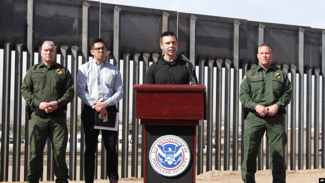Customs and Border Protection Commissioner Kevin McAleenan (C) announced that the Trump administration will temporarily reassign several hundred border inspectors during a news conference at the border in El Paso, Texas, March 27, 2019.