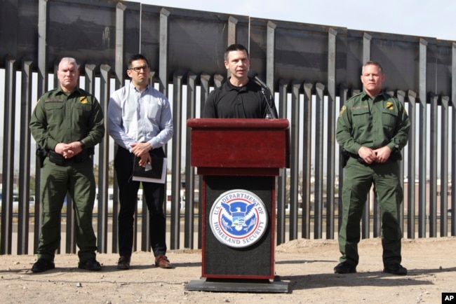 Customs and Border Protection Commissioner Kevin McAleenan (C) announced that the Trump administration will temporarily reassign several hundred border inspectors during a news conference at the border in El Paso, Texas, March 27, 2019.