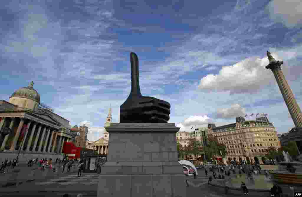 The new Fourth Plinth sculpture, &quot;Really Good&quot; by British artist David Shrigley, is pictured in Trafalgar Square in central London. Shrigley is best known for his distinctive drawing style and works that make satirical comments on everyday situations and human interactions. &quot;Really Good&quot; is a seven-meter-high hand with a disproportionately long thumb giving a thumbs up.