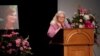 Car attack victim Heather Heyer's mother Susan Bro receives a standing ovation during her remarks at a memorial service for her daughter at the Paramount Theater in Charlottesville, Virginia, Aug. 16, 2017. 