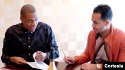 Romeo Santos (derecha) yJay Z se han unido en el mundo de los negocios musicales.