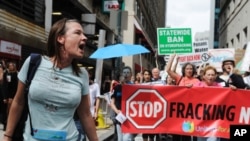 Breast cancer survivor Dana Dolney, at the Shale Gas Outrage protest in Philadelphia, wants the names of chemicals used in fracking to be publicly disclosed.